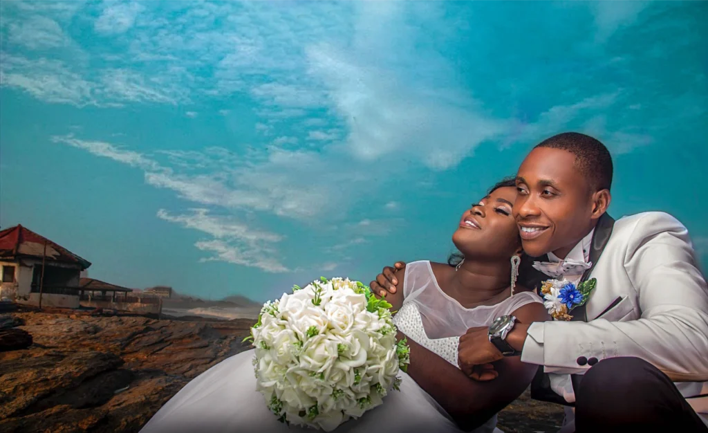 Wedding couple photographed on the beach